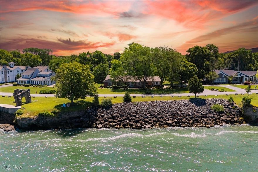Nestled in the prestigious enclave of Catawba Cliffs and perched above the shimmering waters of Lake Erie, this exceptional residence offers breathtaking panoramic views of the lake and its idyllic islands. Set on .64 acres, this 3-bedroom, 3-bathroom home perfectly blends solid craftsmanship and timeless design.
Experience spectacular sunsets from the comfort of your living room, where expansive windows frame nature's nightly masterpiece. The thoughtfully designed kitchen features floor-to-ceiling cabinetry for maximum storage, oversized drawers for cookware, a built-in spice drawer, and custom compartments for cutting boards and bakeware, delivering both form and function for the home chef.
Additional highlights include a dedicated office space, generous storage, and the enduring quality of well-constructed architecture, making it ideal for year-round living and a luxurious seasonal retreat.