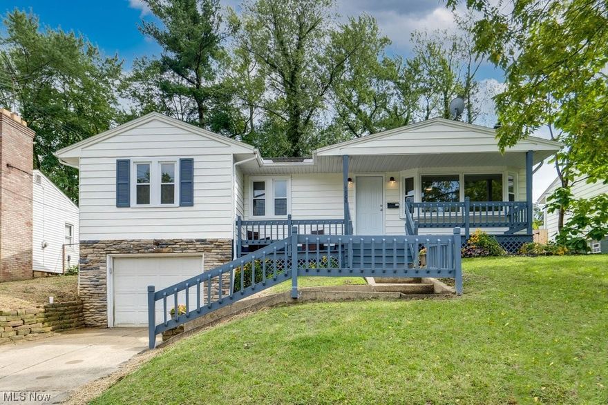 Introducing 1568 Kingsley Ave in Akron! This stunning home has undergone a complete renovation, marrying modern comforts with classic allure. Boasting exquisite craftsmanship and attention to detail, this 3-bedroom, 2-bathroom abode is a true gem. The open-concept living area greets you with abundant natural light, highlighting the brand-new flooring and fresh paint throughout. Settle into the family room by the cozy fireplace and large bay window. The kitchen, equipped with new appliances, beautiful granite countertops and all new cabinetry offers a modern culinary space. Finishing the main level, you'll find three comfortable bedrooms, accompanied by a large modern bath. As you head down to the newly finished basement, you will have plenty of options to make a recreation area, entertainment hub or even another bedroom along with an additional new full bath to add convenience and flexibility to the layout.  Step outside to a new finished patio, perfect for outdoor enjoyment. The cover