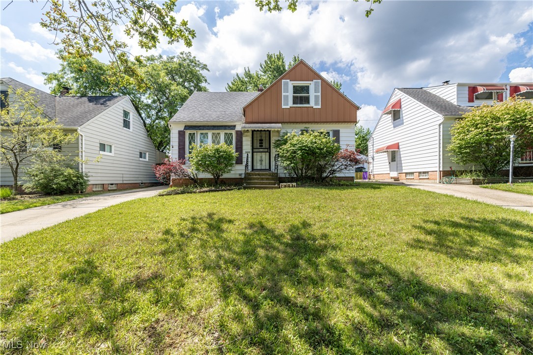 Welcome home to this charming cape cod nestled on a quiet, no-outlet street. This home is brimming with potential. The spacious eat in kitchen with tile floors and an open layout is ready for your personal touch. The main level features hardwood floors throughout the living room and two bedrooms, all serviced by a full bath. Upstairs, you'll find a generously sized third bedroom, also with hardwood floors. The closet space is abundant throughout the home. The basement offers versatility with a second full bathroom, laundry room and finished rec room. Outside enjoy a two car garage and a low-maintenance yard. With just a bit of customization and vision this home will be the gem of the neighborhood. Schedule your showing today and make this home yours.