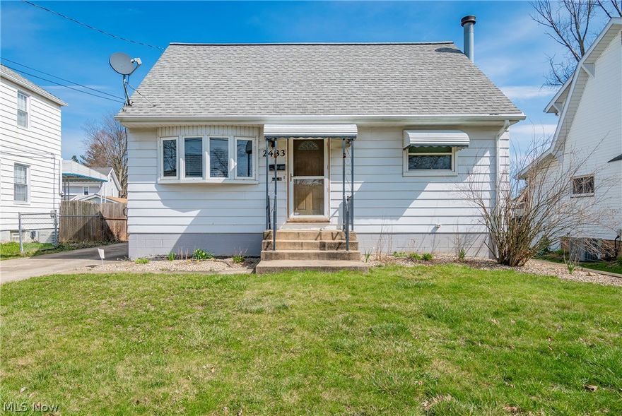 Welcome home to 2483 8th Street! Don't miss this cozy cape cod conveniently located near downtown Cuyahoga Falls and Portage Crossing restaurants and shopping! The main level boasts a living room with hardwood floors and a kitchen with a nearby dining area. There are also two great sized bedrooms and the first full bathroom. You will find an owner's suite on the upper level offering a spacious bedroom with luxury vinyl and the second full bathroom. The lower level provides a finished living area with a fireplace, perfect for a family room or rec room. There is also a laundry space and plenty of storage. The exterior features a fenced-in backyard along with a 2 car detached garage. Schedule your private viewing today!