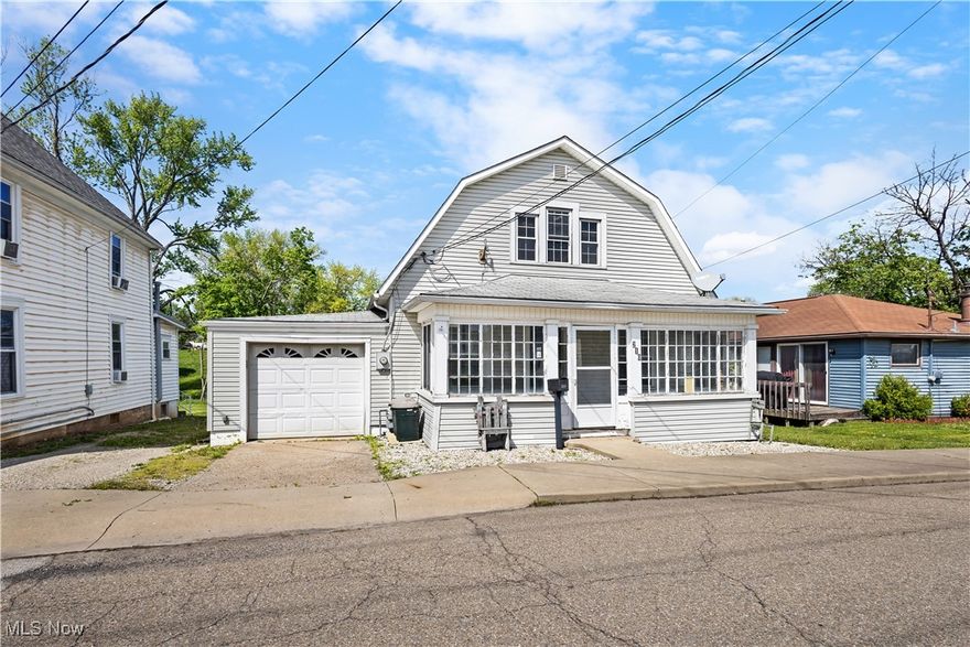 This classic Woodsfield home offers space, charm, and versatility—inside and out. With 3 bedrooms, 1.5 baths, and multiple large living areas, there’s room to spread out and make it your own. The spacious kitchen connects to a rear mudroom, while a sunny three-season front porch adds a welcoming touch. You'll find original woodwork and hardware throughout, plus updated vinyl windows, central air, a gas furnace, and a heated/cooled 1-car garage. The fenced backyard features a generous deck, storage shed, and both on- and off-street parking. The walk-out basement includes a great workshop or crafting space with extra storage. All just blocks from the park and pool, and minutes from the Monroe County Fairgrounds and town center. With solid bones and vintage appeal, this home is full of potential and ready for your vision. Schedule your showing today and see how easily this one could feel like home.