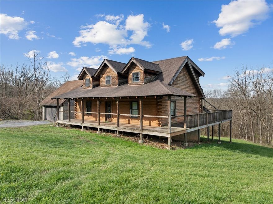 Picture the possibilities waiting on these 11.64 private acres, where a little vision and some thoughtful TLC could breathe new life into this rustic log home and turn it into the country retreat you’ve always imagined. Tucked away in a peaceful setting just minutes from State Route 22, this property offers the rare chance to create something truly special while enjoying both privacy and convenience. Inside, soaring cathedral ceilings and an open-concept layout set the stage for warm gatherings and cozy evenings by the fire. The kitchen, dining, and living spaces flow together beautifully, offering the perfect canvas to update and personalize to your taste. Two main-floor bedrooms provide everyday ease, while the third bedroom and flexible basement space offer room to grow, including the potential for a third full bath. Outside, the charm continues with a wraparound deck just waiting to become your favorite place for morning coffee, summer barbecues, or quiet evenings listening to nature. The detached garage offers generous storage above and below, making it ideal for hobbies, tools, and outdoor equipment. With its solid bones, scenic acreage, and endless potential, this is more than a home needing a little love, it’s an opportunity to create your own private woodland haven from the ground up. Call an agent and schedule your showing today!