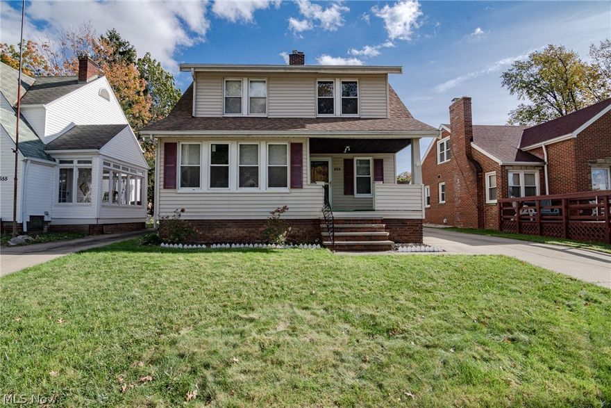 Great opportunity for a charming colonial in a prime location in Euclid! This well-kept home features 3 bedrooms, 2 full bathrooms, an updated kitchen, and more! Step up to the front porch and into the spacious living room where you will find refinished hardwood floors, a coat closet, and an open entry to a beautiful sunroom at the front of the house. The formal dining room boasts leaded glass cabinets, a built in bench, and an elegant light fixture. The kitchen was just redone and features crisp white cabinets and a full complement of appliances. An updated full bathroom off of the kitchen completes the first floor. Upstairs, there are three bedrooms, two with hardwood flooring and one with fresh carpet. All bedrooms have ample closet space and the largest includes built in shelving as well! A beautifully redone full bathroom off the upstairs hallway features a trendy accent wall, built-in cabinets, and a clawfoot tub. The unfinished lower level has just been repainted and includes a