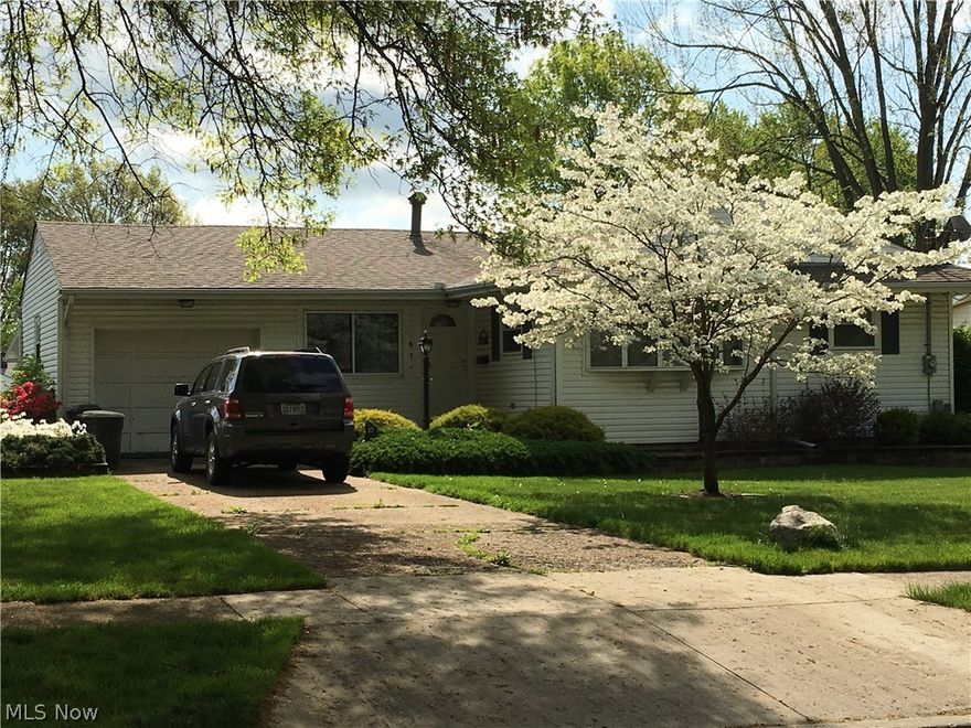 This nice family fun home offers 3 bedrooms, 1.5 baths, relaxing sunroom with 7 sliders, part finished basement, attached 23x12 garage, Homestead in-ground heated pool, outbuilding, and composite deck. Quality kitchen cabinets. Appliances include refrigerator, gas stove, dishwasher, garbage disposal, washer, dryer, and central air. Ceramic floor in kitchen with easy-care laminate in dining room. Third bedroom currently used as first-floor laundry.  Large living room with a large bay window.  Extra shower in basement.  Vinyl windows throughout.  Nice floor plan in this comfortable ranch very convenient to schools, library, and park.  Numerous major updates in 2007.  City sewer and water, paved driveway.  Outbuilding 11x14 and 14x9 shed. Area well kept homes!