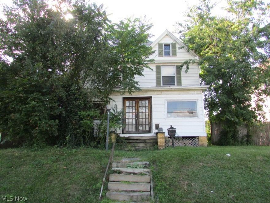 Large 2 story home with plenty of upside.  The first floor has nice sized rooms and a corner fireplace.  All of the bedrooms are large and there is a large open attic providing plenty of space throughout the home.  The large, mostly fenced back yard provides a private outdoor area.  Property Sold As-Is.