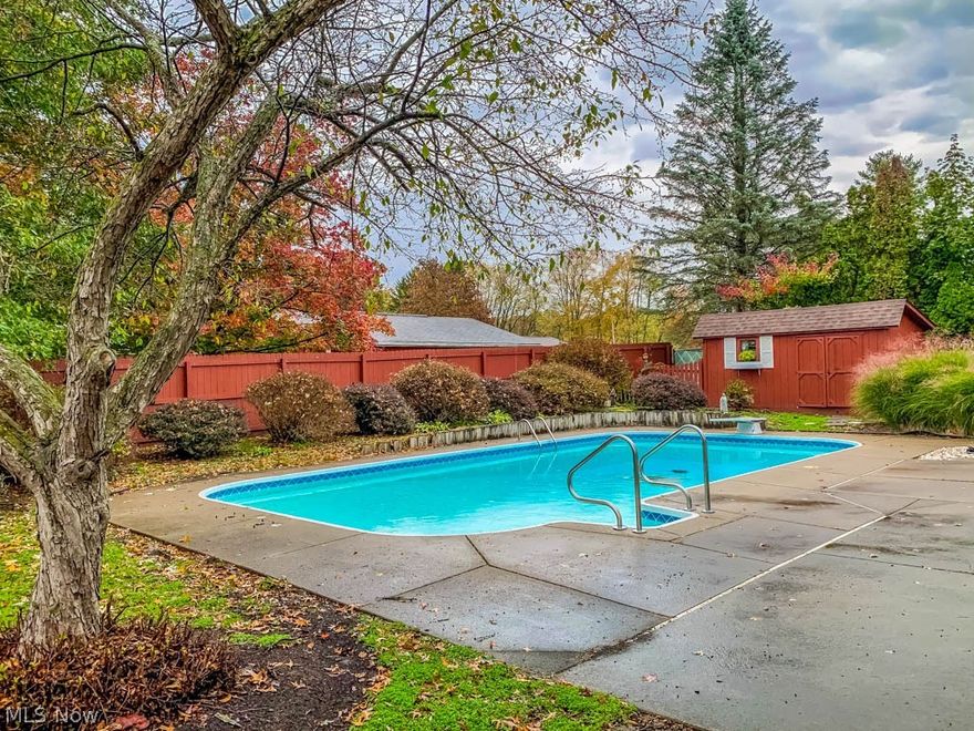 Beautiful 3 bedroom, 2 full bath 4-level split with an amazing backyard! Fully fenced backyard oasis features an inground pool, patio and barn. Newer pool heater (2 years) and filter (6 months)! The main level has a sprawling living room that opens to the dining room and a kitchen with newer stainless steel appliances. Kitchen has white cabinets and sliding doors to the backyard. Upstairs, there are 3 bedrooms and a full bath. Second full bath on the lower level along with a spacious family room with a woodburning fireplace. Unfinished basement allows for storage with shelving and a new hot water tank. Brand new carpet and fresh paint throughout! 2-car attached garage with a new opener. Don't miss out!