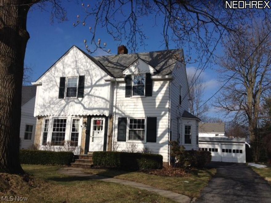 Charming Colonial conveniently located within minutes to I-90, shopping, restaurants and Metro Parks. Bright southern light from floor to ceiling living room windows highlights the refinished hardwood floors. Eat-in kitchen with appliances. Formal dining room. Three season enclosed porch can serve as extra living space or handy mudroom. Lower level family room has ceramic flooring, glass block windows and full bath. Second floor has two very spacious bedrooms each with large walk-in closets plus office/den area. Plentiful storage. Replacement windows 2000. AC 2006. Private, lushly landscaped yard and brick patio. 2 car garage with openers.