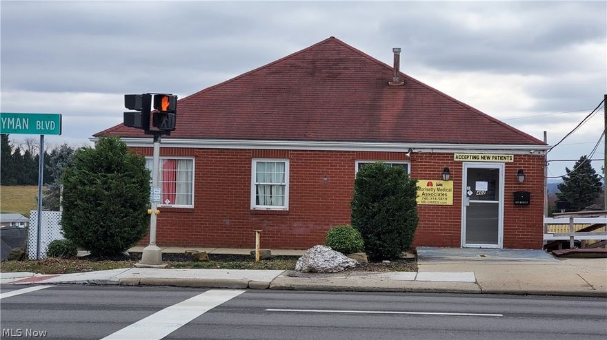 Located on the corner of Main Street and Stardust Drive, this highly visible property sits at a traffic light where 22,000 cars pass by daily. This is one of the most heavily traveled locations in Jefferson County. Previously utilized as a medical office, this property has endless potential. The lower level features a one bedroom apartment with separate electric service and private entrance. Private parking lot with approximately 20 spaces. This property will be offered for sale or lease, owner will lease the office and apartment spaces separately. Lot on the corner of Main Street and Simpson (available for negotiation) could be utilized for additional parking.