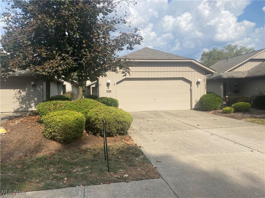 Don't miss the virtual tour. The outstanding quality of a Bob Schmidtt built home is on full display here at 12935 Olympus Way in the Premier 55+ Community known as Olympia of Strongsville. Welcome to this impeccably maintained ranch-style home nestled in one of the area's most desirable active adult communities with resort style amenities. Offering a perfect blend of comfort, convenience, and low-maintenance living, this home features a spacious floor plan, cathedral ceilings, abundant natural light, and a thoughtful single-level design. The open concept living/dining/kitchen flows easily.  Tuck away the TV behind the built in living room cabinetry.  You'll love morning coffee in the dining area with lovely views through the wall of rear windows to the rear patio and to the open woods beyond.  This sweet functional kitchen includes all the appliances, washer and dryer, too.  Your primary bedroom is quite spacious as are the the generous his/hers walk-in closets and ensuite bath. Your guest bed and bath provide room for friends/family overnight visits or home office. As is custom with a Bob Schmidtt home, storage is a plenty. Enjoy a peaceful lifestyle with access to exceptional community amenities, including a sparkling swimming pool—perfect for getting some laps in, a well-equipped fitness center, and a welcoming clubhouse ideal for social gatherings and events. Whether you're relaxing on your garden patio or taking a short stroll along the path to enjoy the amenities, this home offers everything you need to live your best life. This home is as clean as a whistle. Don't miss the opportunity to own a move-in ready gem in a vibrant, active adult community where neighbors become friends and every day feels like a vacation.