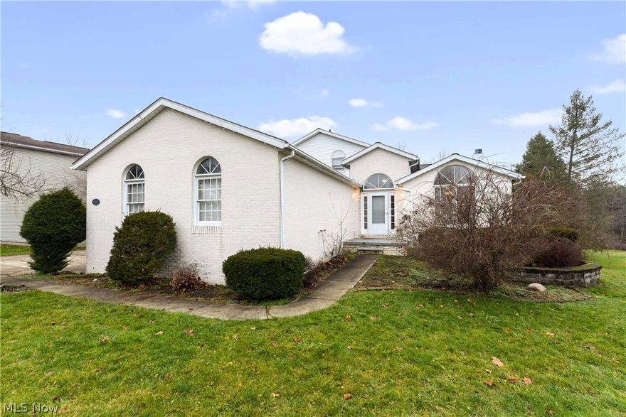 Large Multi-Level Home Features 4 Bedrooms and 3.5 Baths! Possible Separate Living Suite In Walk-Out Basement Or Great Work From Home Space. Kitchen Updated With Modern Counters and Appliances. Neutral Colors Throughout. First Floor Master Bedroom With Two Walk-In Closets! Master Bath With Jetted Tub. Three Car Garage. Oversized Half Acre Lot. Shed and Multi-Tier Deck. Three Season Room. Two Fireplaces!