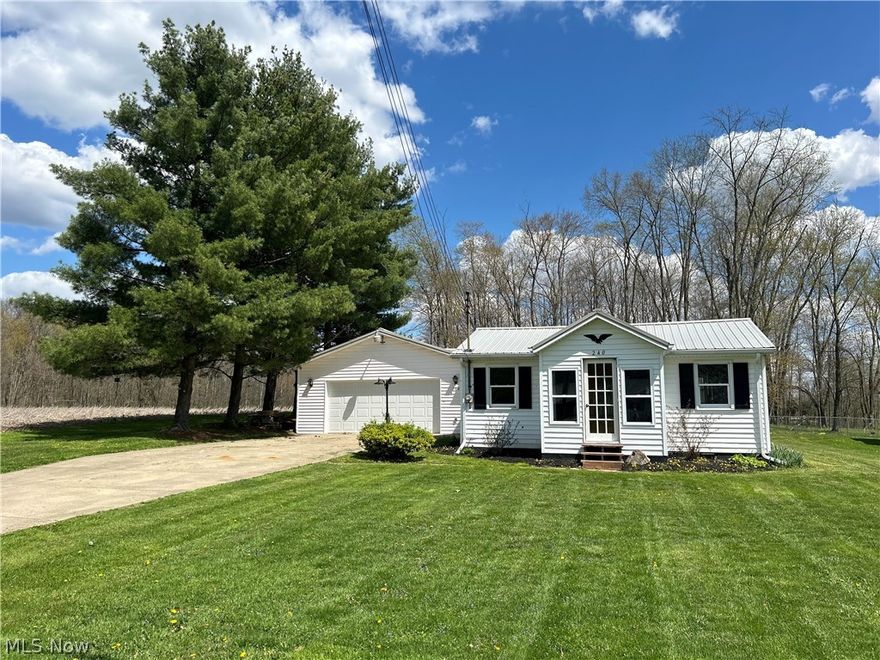 Quaint move in ready home in West Farmington Village.  This remodeled home has been remodeled from the studs out including new electrical, plumbing, flooring, appliances, fixtures, bathroom, lighting, most windows and doors and a new deck.   2 bedrooms, 1 full bath.  Open Living Room, Dining Room, Eat in Kitchen concept.  Cozy front porch with natural lighting.  Utility Room has washer and dryer hookup along with a new furnace and a tankless hot water tank.  New Wood deck overlooking the open back yard with woods behind it.  Oversized 2-4 car garage.  Newer metal roof in 2021 and newer vinyl siding.  Concrete Drive.  Wonderful opportunity in this quality renovated home.