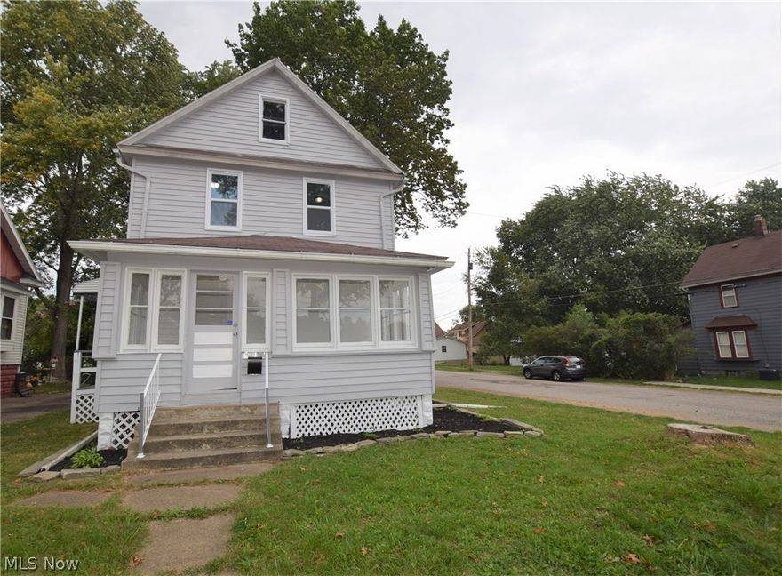 Welcome to 135 Oakwood Street in Barberton! This stunning home has been completely updated inside, out. The entire house has all new flooring and paint. The immaculate kitchen has incredible, modern concrete counter tops, bright white cabinets, tile backsplash, and new lighting fixtures. A convenient full bathroom is located directly off the kitchen. Off the spacious living room, there is a completely enclosed front porch full of windows – the perfect area to relax! Head upstairs to find three bedrooms and a second full bathroom. The bathroom uniquely has a doorway that leads to a large balcony on the back of the house. Underneath the balcony, there is another porch on ground level that leads into the kitchen. The basement walls, ceiling, and floor have all been recently painted – making the basement fresh and clean! This home has two garages as well as a brand new AC unit. Don’t miss your chance to own this incredibly beautiful home!