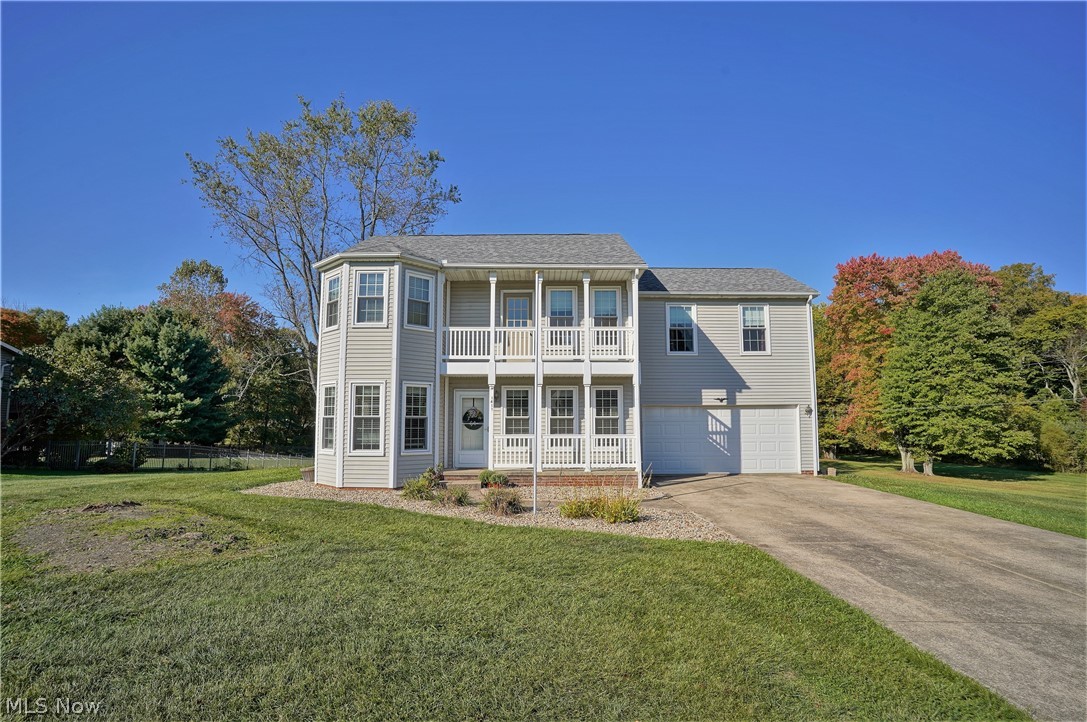 WOW! Welcome home to this six plus acres of tranquil setting with a pond and two creeks, offering three bedrooms and two and half baths. Come on in from the new landscaped (2020) outside to the beautiful front porch, and into this bright, stunning open living room, dining area and kitchen which offers new laminate wood flooring though out most of the home, new light fixtures (2017-2019), and new windows (2014). The updated gorgeous kitchen offers abundant of newer cabinets (2019), countertops (2019), appliances (2018), and a slider door to the back porch where you can sit and enjoy the peaceful views of the beautiful pond. There is a laundry room with cabinets and a half bath to finish the first floor. The upstairs has three bedrooms with ceiling fans and two updated full bathrooms. The master suite has a balcony that overlooks the fantastic backyard and pond. Updated master bath has a shower with jetted tub, and double sinks. Partially finished basement offers more space, and storage.