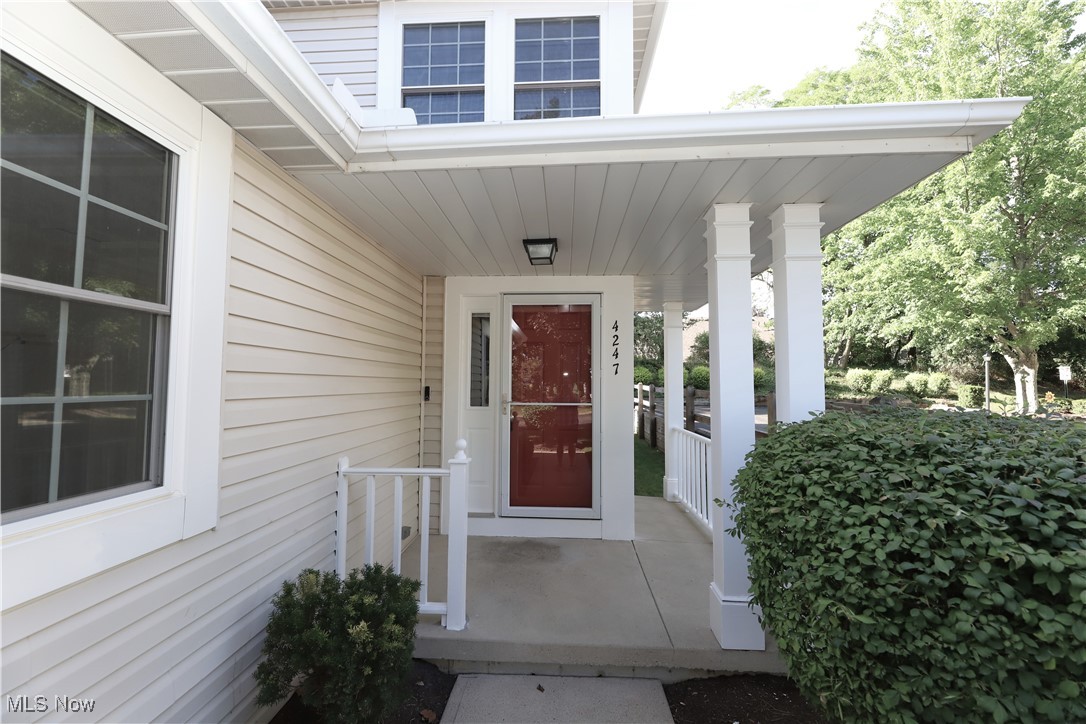 Welcome Home to this beautifully updated end-unit Townhome ! LVP flooring throughout the first floor. Updated Kitchen offers all stainless steel appliances, painted gray cabinetry, subway tile backsplash. Spacious Family Room with slider to the private deck area. Newly updated 1/2 bath. Upstairs you will find the Primary Bedroom which has ample closet space, a 2nd large Bedroom and an updated full bath. The basment is fully finished with a large Rec Room, storage and Laundry Room. Updates include: all new painting 2025, all new carpet 2025, bathroom vanities 2025, HWT within 4 years. A must see!