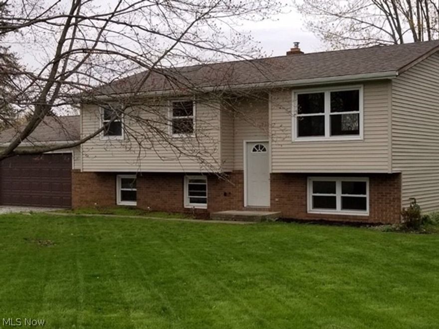 Newly renovated home featuring 4 bedrooms and 2 baths. The kitchen has brand new cabinets, with gorgeous white granite. The 2 bathrooms have been completely renovated with new tile, paint and flooring. On the lower level there is a newly renovated entertainment center waiting for your personal touches. Agent owned. This house will not last long! Call today to schedule your private showing.