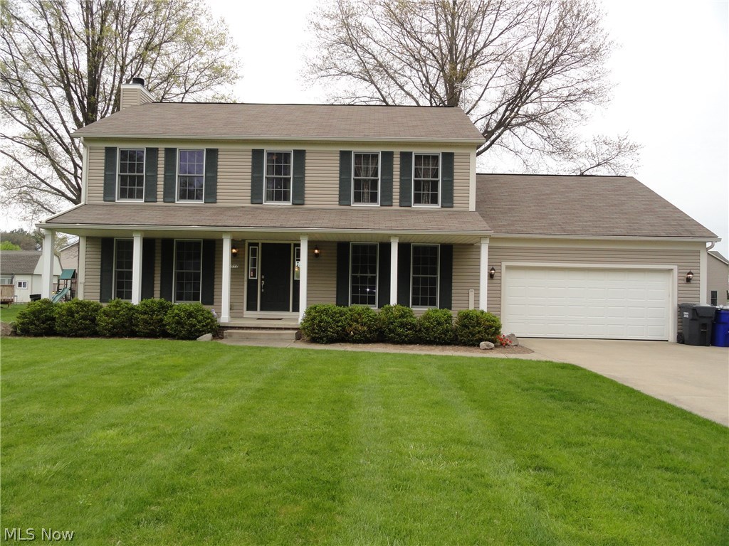 Sharp Colonial in The Meadows at Marsh Creek. Welcoming porch steps into foyer entry with open staircase. Spacious Great Room with wood-burning fireplace. Recently updated beautiful kitchen with bay windows, black granite counters, tiled backsplash and ceramic tile floors. First floor laundry, 1/2 bath, and formal dining room too! Four bedrooms and 2.5 baths. The master bathroom has a garden tub, separate shower, dual sinks and large walk-in closet. The lower level offers an additional 500 square foot finished area done with professional quality. Large stamped concrete patio overlooking the 1/2 acre lot, beautifully maintained and manicured to include a 12 x 16 shed. The two car attached garage is insulated and extra deep with 8 additional feet. Nice concrete driveway plus extra parking pad. Water softener, central vac, security system, leaf filter, and more! Updates include dishwasher in 2016, sump pump in 2015, water heater and refrigerator in 2014. Don't wait!