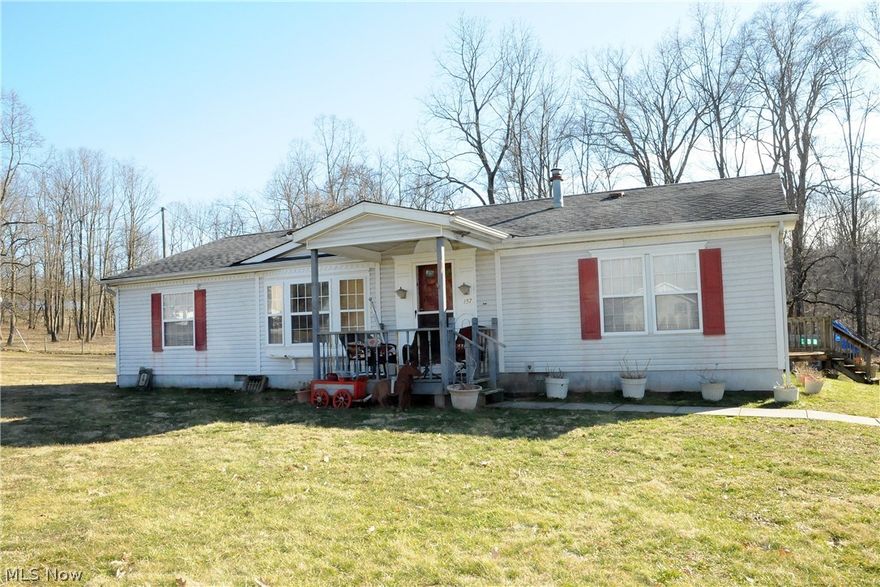 Must see!   Interior of home has been completely renovated.  New paint, flooring, appliances.  New master bath. New hot water tank.  Grey storage shed with red trim stays