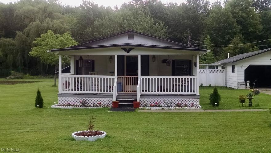 Three bedroom, one and half bath manufactured home. Detached two car garage. Large yard.