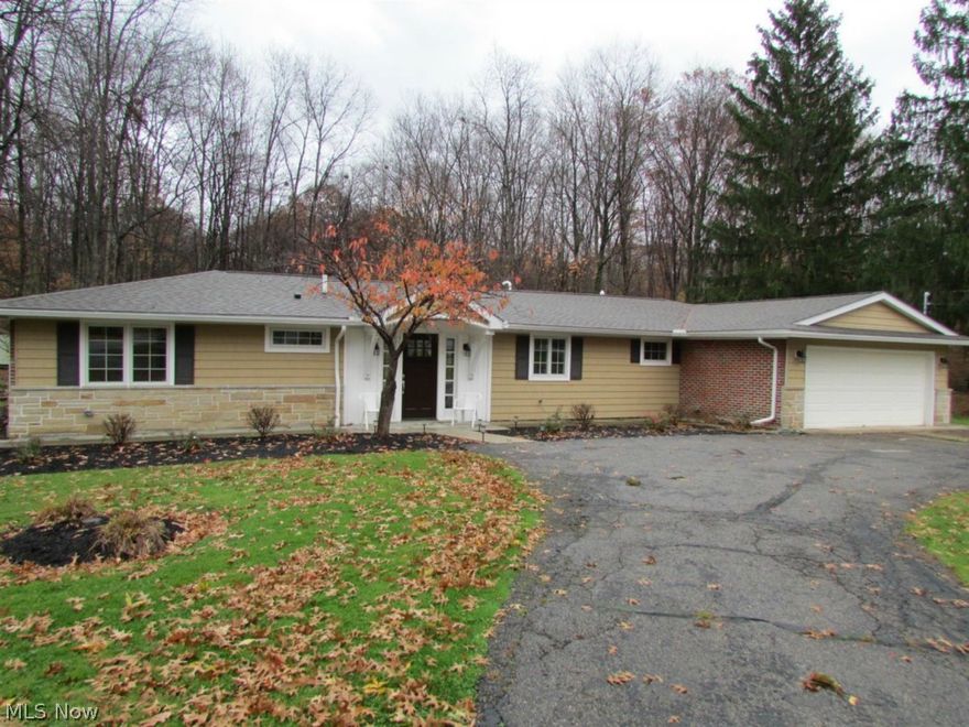 Beautiful and renovated top-to-bottom ranch on large lot backing up to acres of Metroparks. Present owners spared no expense in updating this 3 bedroom, two full bathroom home. New roof, siding, front and rear doors, landscaping, skylight, windows (Anderson), soffit/gutters/downspouts on the exterior. New furnace/AC, high efficiency water tank, insulation, drywall, doors, granite in the kitchen, carpeting, tile work, plumbing fixtures, light fixtures, flooring… the list goes on! A large foyer welcomes you to this open layout floor plan. Kitchen has stainless appliances, granite counters and overlooks the spacious 28x14 Great Room. Great room walks out to .90 acre yard that backs up to Metroparks. Master suite features large walk-in closet with built-ins galore and completely updated bathroom with double sinks and modern feel. Two additional bedrooms each have spacious closets and share an updated bathroom. This home is turn-key, gracious and completely up to date.