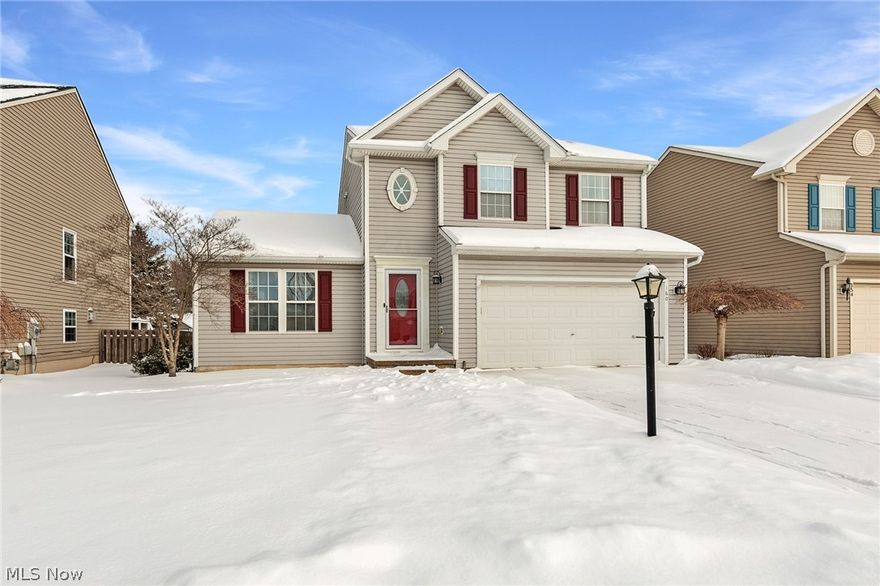 Welcome to this beautifully maintained home in Berea's desirable Sandstone Ridge community. Step inside to a welcoming two-story foyer that immediately sets the tone for the rest of the home. The grand family room features vaulted ceilings and an open-concept layout perfect for both everyday living and entertaining.

The family room flows seamlessly into the newly updated eat-in kitchen, which boasts LVP flooring, new cabinetry, quartz countertops, and black stainless steel appliances. Convenient first-floor laundry includes a high-end washer and dryer. A sliding door off the eating area leads to the patio, complete with a fire pit ideal for relaxing or hosting friends and family.

The second level offers spacious bedrooms, with the primary suite featuring dramatic vaulted ceilings, a walk-in closet, and a private en-suite bath. Located just minutes from the Metroparks and close to shopping, dining, and entertainment, this home truly has it all. Don't miss this opportunity, schedule your private tour today!