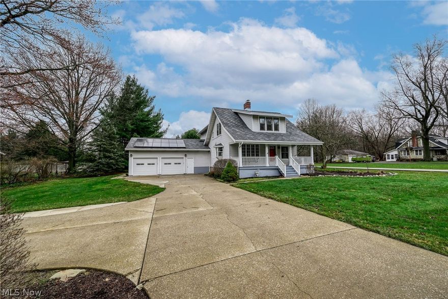 Welcome Home! Step into timeless charm in this classic 1926 Colonial! Offering 2300+ square feet of living space that perfectly blends character with modern updates! Situated on a rare 1.42 acre lot, this well-maintained home welcomes you w/a full front porch complete w/a relaxing swing! Inside, the living room features natural hardwood flooring, a brick woodburning fireplace, & original built-in glass front bookcases! The massive (13 X 30) fully applianced Kitchen is truly the heart of this home & showcases custom cherry cabinetry, solid surface countertops, tile backsplash, under cabinet lighting, a built-in lighted hutch, breakfast bar & a 36 inch GE Monogram gas range. A bright bay window floods the kitchen w/natural light. The kitchen even includes a custom built dining table & chairs that seats 8! The kitchen flows seamlessly into the impressive family room addition, making it ideal for both everyday living & entertaining! The first floor also includes an updated full bath w/step-in shower, LVT flooring & skylight & a convenient 1st floor laundry room. The rear staircase leads upstairs to the spacious owner's suite featuring a bay window, walk-in closet & private bath w/jetted tub, ceramic tile walk-in shower, double sinks & LVT flooring. Three additional bedrooms complete the 2nd floor, two with walk-in closets. Bedroom 4 also includes a charming 5 X 9 loft space w/ladder access. The main hall bath was just renovated! The split basement offers excellent storage or potential for future living space. Outside, a large, freshly stained deck w/storage below extends from the family room & steps down to a 16 X 24 patio - perfect for outdoor entertaining in the peaceful, park-like backyard! 2.5+ car garage! Solar panels that significantly reduce electric bills add even more value! Fantastic location - close to everything with quick access to Route 8! Character, space and a beautiful setting - this one truly has it all! Schedule your private showing before it is gone!