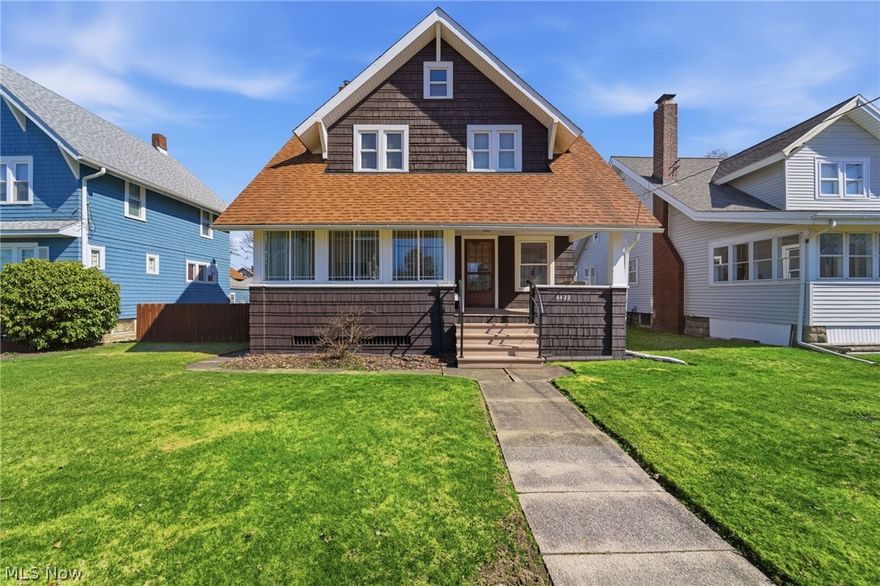 Gleaming woodwork sparkles throughout this charming colonial family home! Meticulously maintained and updated, you can tell she has been loved and cared for! At the front there is a cozy covered front porch that enters into a large living room with the show stopping hardwood details featuring a decorative fireplace.  There is an adjacent dining room that boasts oak French doors into a bonus room/office with tons of natural light and all newer vinyl windows! The other side of the dining room flows into your fully functioning kitchen with refrigerator and range.  Upstairs you will find three nicely sized bedrooms and a large bath. With a huge attic above, you have options for additional space! There is a cedar fence around the back yard with a one and one half car garage that has room for all your mechanicals! The home sits on a private alley that has been recently paved and is maintained by the City. You wont want to miss the quality and comfort this home has to offer!