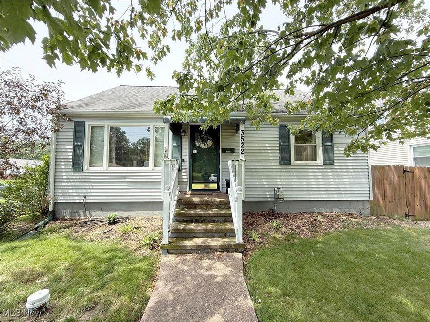 Welcome to this spacious and charming 1,231 sq ft 3-bedroom Bungalow situated on a desirable corner lot! Step inside to find beautiful original hardwood floors that add warmth and character throughout much of the home. The awesome kitchen offers plenty of wood cabinetry and ample counter space—perfect for both everyday cooking and entertaining. Enjoy peace of mind with a brand-new central air unit installed in 2024, keeping you cool all summer long. Outside, relax or host on the wood deck, and take advantage of the 2-car detached garage for extra storage and parking. This well-maintained home blends classic charm with modern comfort and is ready for its next owner to make it their own!