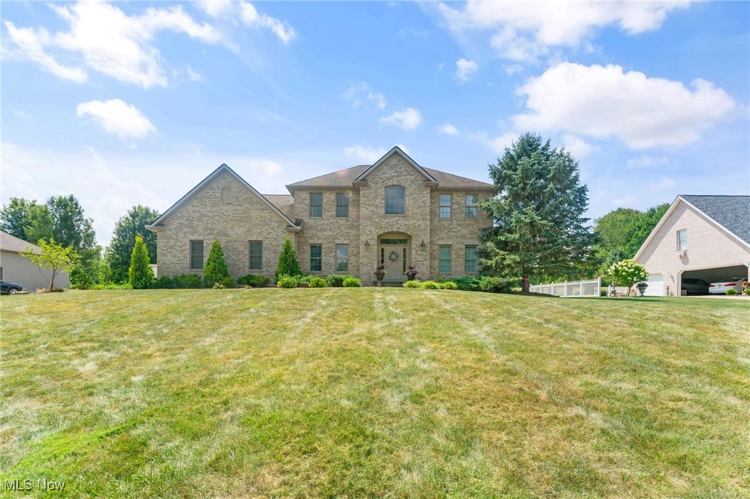 Welcome to 8518 Ivy Hill — a stunning brick conventional two-story home ideally situated near I-680, just minutes from the shopping, dining, and conveniences Boardman has to offer.
Step inside to a light-filled two-story foyer that sets the tone for the home’s inviting layout. The formal dining room flows into a bright kitchen featuring a breakfast-bar island, seamlessly opening to the spacious living room and private office — all on the main level, perfect for both daily living and entertaining. Off the garage and kitchen, you’ll find a full bath and laundry room for everyday ease.
Upstairs, the generously sized owner’s suite offers a large walk-in closet and a spa-like ensuite bath. Three additional bedrooms share a full bathroom with double sinks, ideal for busy mornings.
The full finished basement expands your living space with a comfortable family room, a versatile flex space perfect for a playroom, an additional bedroom, and a full bath — plus convenient walk-up access to the garage.
Out back, enjoy your recently fully fenced yard, complete with an expansive patio, a stylish retaining wall, and French drains for peace of mind. Whether you’re hosting summer gatherings or relaxing outdoors, this yard is designed for enjoyment.
Move-in ready, thoughtfully designed, and perfectly located — this home checks all the boxes!