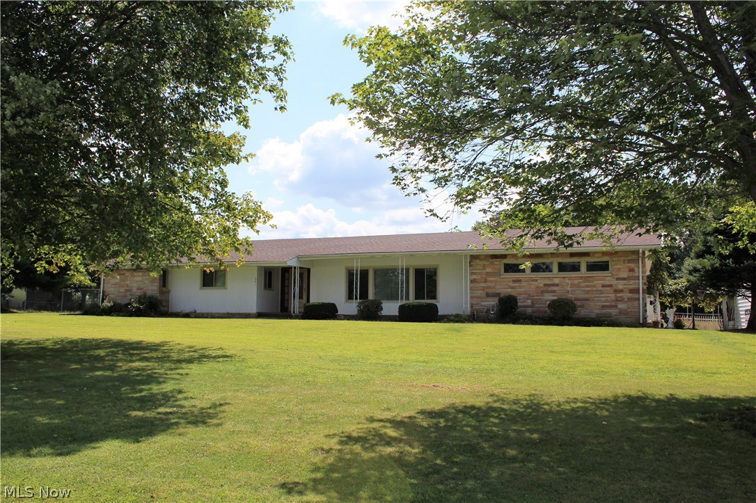 Welcome to 941 Youngstown-Kingsville Road. This impeccably-maintained 4-bedroom, 3-bath ranch home is nicely situated on 5 acres. You'll spend lots of time in the spacious living room with fireplace to warm you on chilly nights. The kitchen comes with lots of storage and all appliances and the dining room offers plenty of seating to accommodate your family and friends. Rest and relax in the cozy family room. Additional features include central air, full basement, two car attached garage and large detached garage. Updates include roof (2017) and windows (2015). A HOME WARRANTY is included for a worry-free purchase. This one is a true "must-see.". Make an appointment to view this phenomenal home.