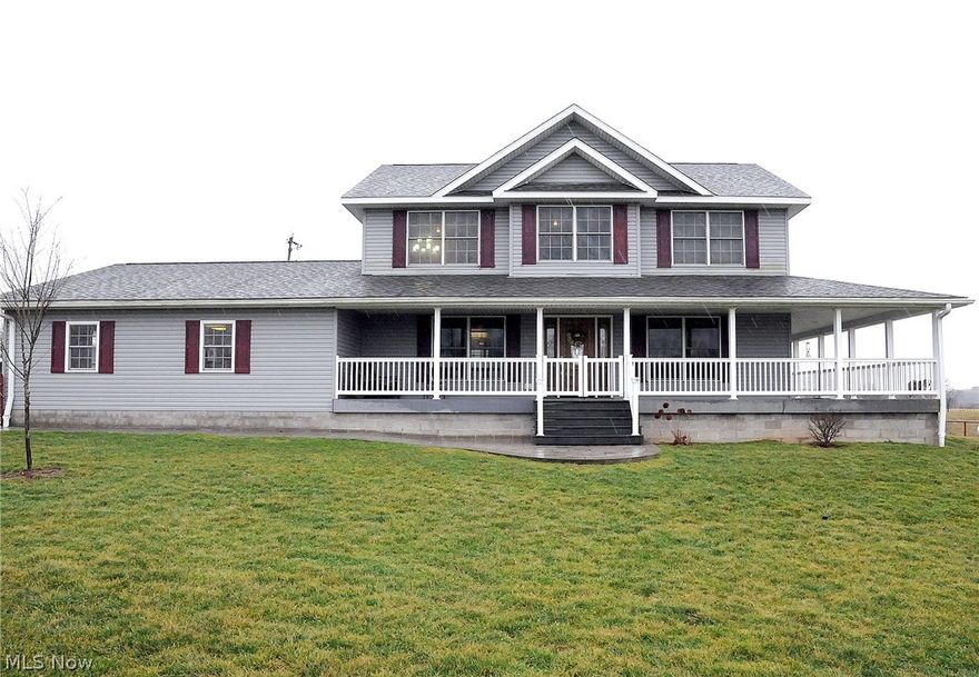 Beautiful 2 story home in great condition!( 2007 construction) This lovely home offers 4 BR's, open concept main floor featuring high end appliances, Corian countertops & ample cabinets in the kitchen.  Main floor master, 3 BR's upstairs.  Open area on 2nd floor could be play area, office or additional family space.  Sit
on the large wrap around porch to enjoy the country setting.  There is an extra large 2 car garage, a 16 x 22 building with a chicken coop, and a newer 28 x 22 two stall horse barn.