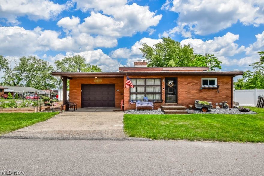 Don't be fooled, this all brick 4 level split is larger than it looks from the outside!  The well thought out interior offers a living room with hardwood flooring and a gas fireplace with a full wall brick surround. You'll appreciate the cabinet and counter space in the kitchen with updated flooring that continues into the dining area with access to the covered porch, and an amazing fully fenced backyard with a tiered patio and retaining wall!  All 3 bedrooms have ample closet space, hardwood floors, and easy access to the full bath featuring new flooring, commode, medicine cabinet and glass block window in the shower. The unfinished basement provides tons of space for storage plus a laundry area with newer utility sink. Recent updates include a concrete driveway, white vinyl fenced backyard, new wall oven and dishwasher cabinet in kitchen, new garage door, flooring in kitchen, dinette, and bathroom, storage shed (negotiable), 6 new vinyl replacement windows, gutters, and downspouts 20