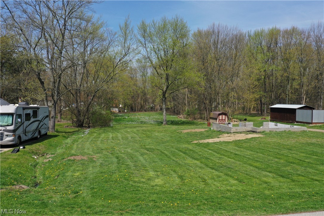 Looking to build your dream home? This lot is cleared and ready to go. It has water, gas, and sewer at the existing foundation you can build on top of, or you can start fresh. The lot has 100 feet of frontage and is 383 feet deep. The back of the lot is also cleared with a nice border of trees for privacy. There is also a shed already located on the property. This opportunity doesn’t come along often! Make sure to set up an appointment and come take a look!