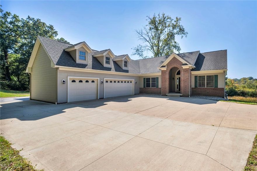 Welcome to your lakeside escape! Nestled on a scenic 1.5-acre lot along the tranquil Long Lake Channel in the highly desirable Portage Lakes area, this beautifully maintained 3,528 square-foot ranch home offers the perfect blend of comfort, functionality, and waterfront charm. Step inside to an inviting open-concept main floor featuring an eat-in kitchen that flows seamlessly into the living and dining areas—perfect for entertaining or quiet evenings at home. Enjoy your morning coffee or evening sunsets on the elevated deck just off the kitchen, offering peaceful views of the channel and surrounding nature.The main level boasts 3 bedrooms and 2 full bathrooms, including a generous primary suite. Downstairs, the fully finished walk-out basement is an entertainer’s dream with a custom wet bar, theatre screen, 2 additional bedrooms, a third full bathroom, and a bonus room ideal for storage, a home gym, or a craft space. The lower-level patio provides another great spot to relax or host guests with easy access to the water. Additional features include a bonus patio off the garage, perfect for grilling or outdoor dining, and a sprawling yard with endless possibilities—whether you’re thinking gardens, a fire pit, or space to launch your kayak. Whether you're looking for year-round living or a weekend getaway, this property delivers the best of Portage Lakes living with direct water access, spacious living areas, and thoughtful outdoor spaces. Don’t miss your chance to own this rare gem on Long Lake Channel—schedule your private showing today!