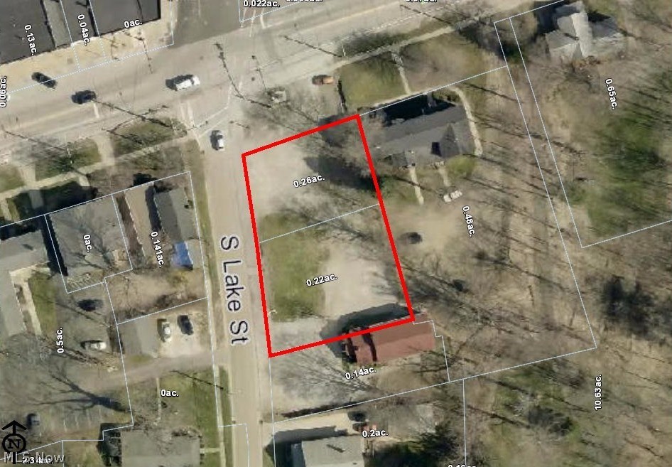 Historic Madison Village. Corner commercial lot with all improvements. Adjacent to brewery, coffee shop, and restaurants. Great location for a good truck in this quaint walking community. 2 parcels total 0.48 acres. Underground utilities present. Property is being sold As-Is. Level and ready for development. Must sell. Reasonable offers will be reviewed.