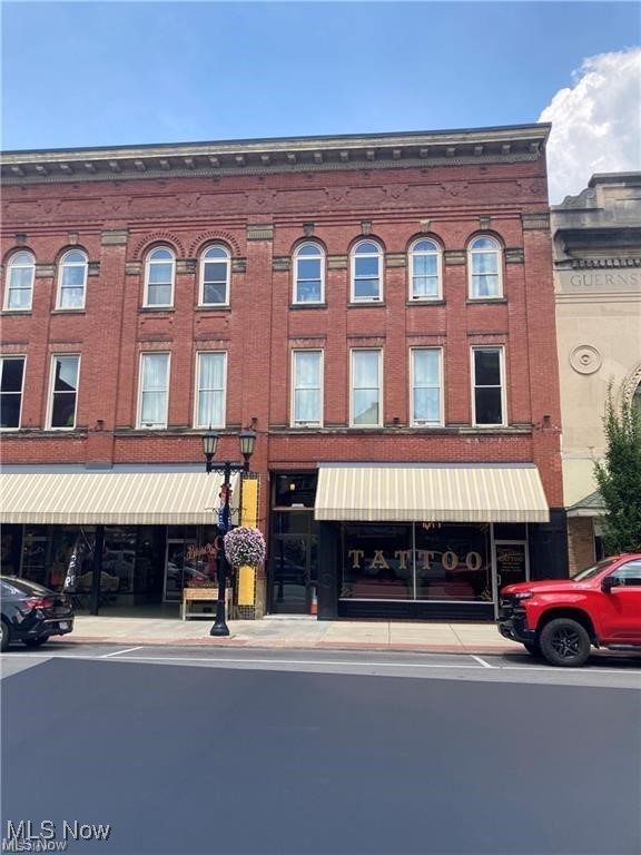 Located in the heart of Downtown Cambridge, this beautifully restored three-bedroom apartment is just steps away from restaurants, bars, salons, banks, and unique local shops. Situated on the second floor of the historic Sylvee Apartments—a building constructed in 1901 and part of a National Register of Historic Places District—this nearly 1,800 square foot unit blends timeless charm with modern comfort. Enter through a secure front or rear entrance and discover soaring 12-foot ceilings, original hardwood floors, ornate woodwork, and expansive, light-filled rooms. Over the past four years, Apartment A has undergone a full renovation, featuring a new kitchen with updated flooring and appliances, refinished hardwoods, historically accurate plaster-work, updated lighting and fixtures from Anthropologie, and a vintage-inspired color scheme. The unit includes a washer and dryer, off-street parking, and disposal service. Tenants are responsible for electric, gas, water, and their choice of internet or TV provider. A minimum one-year lease is required, with first month’s rent and a security deposit due at signing. The apartment will be move-in ready after September 1st.