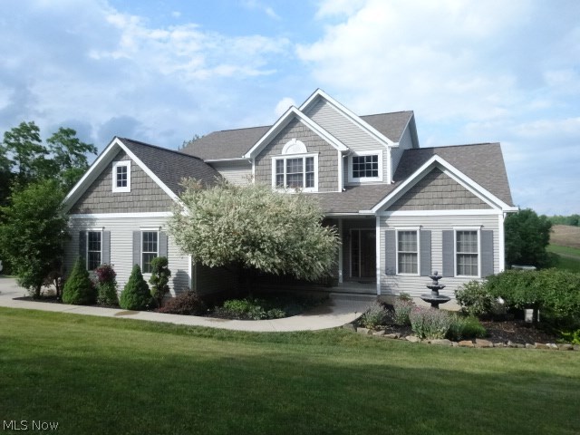 Gorgeous hilltop home located in the highly sought after Sandy Valley area provides a comfortable country feel with views and privacy on just over 6 acres. This 3-4 bedroom, 3.5 bath home built in 2008 feels brand new and features a hard to find 1st floor master suite with his and her sinks, his and her walk-in closets and the perfect garden tub to soak away your cares. Two addl bdrms on the 2nd floor offer great closet space and share a Jack and Jill bath. Large loft makes a great office area or could easily be converted to a 4th bedroom. The gourmet kitchen with granite counters features stainless steel appliances and walk-in pantry and all the amenities to please even the most discerning chef. The kitchen also offers a dinette area that leads to the gorgeous sunroom providing fantastic views of the nature that surrounds your home. Open floor plan continues to the two story great room with woodburning fireplace and dual access to the formal dining room. Convenient 1st floor half bath