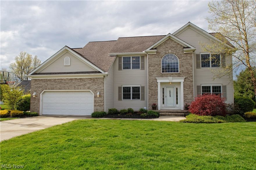 Fantastic  5 bedroom Colonial loaded with extras; gourmet eat-in kitchen with top-of-the-line appliances, granite countertops and loads of cabinetry, kitchen opens to a nice dinette that leads to a  huge trex deck with a covered area and a built in gas grill and an aboveground pool;  formal living room and dining room, family room has gas fireplace;  all 5 bedrooms are upstairs  including master suite with double sink, large shower with two showerheads, a garden tub and walk-in closet; 3 bedrooms plus bonus 5th bedroom complete the second floor a full finished lower level with huge rec room; basement waterproofed in 2012. A must see in sought after South Mentor.