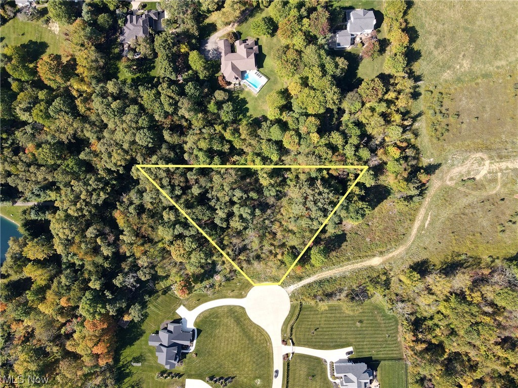 This is the last remaining lot and your final opportunity to build a custom home with your personal finishes in Hidden Lakes of Sharon. Natural splendor and privacy are yours amid the gorgeous hardwoods on this wide lot. At the highest point in the development, this lot will make a grand homesite with a cul-de-sac setting on Graven Way. This beautiful gem of a 2-acre property delivers tranquil and expansive views, all in the highly sought after Highland School District and close to local shopping and major highways in Sharon Township. Your luxury home is ready to be built in this stunning community on a gorgeous lot with beautiful trees and topography. Bring your builder and build your dream home today!