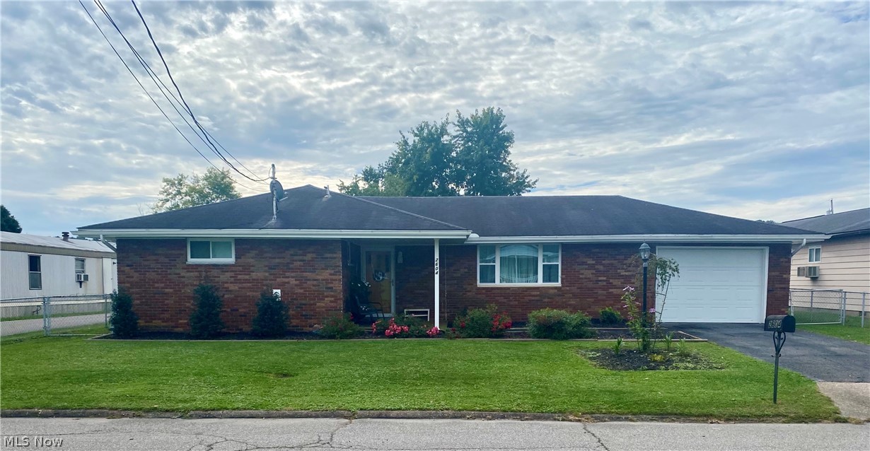 This brick ranch is move-in ready and located close to shopping, groceries and restaurants! This great home features 3 bedrooms, 1.5 baths, large living room, kitchen with new appliances and dining area. Some updates include new flooring, windows and HVAC. The basement offers plenty of storage! Enjoy fall evenings on the covered patio overlooking the large fenced-in yard.