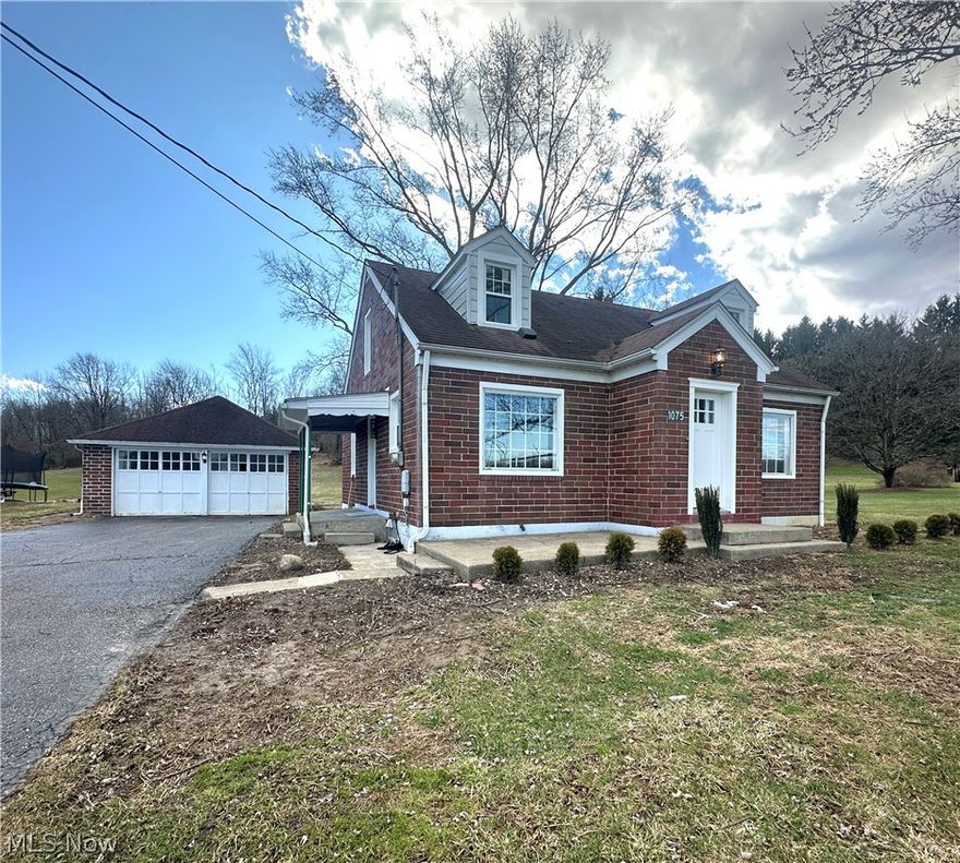 All brick move-in ready Cape cod on a 1+ acre lot, this home has so many updates to mention. The interior has been refreshed from top to bottom, down to the smallest details.  Featuring all new and refinished flooring, fresh paint, updated lighting, a modern kitchen, and renovated bathroom. 2 large picture windows bring so much light into the front of the home, and brand new Polaris paned vinyl windows throughout the rest of home. The home boasts original character from the arched doorways, to the original hardwood floors that have been flawlessly restored throughout the first floor. The brand-new kitchen features stainless steel appliances, new cabinets and hardware, warm butcher block counters, a sleek high-gloss backsplash, and the charm of original hardwood floors. The bathroom has been completely transformed, showcasing a stunning arched ceramic tile shower, new vanity and fixtures, and LVT flooring. Two convenient bedrooms are located on the first floor, while the second floor offers a spacious 17x17 bedroom, bonus room, and cozy nook with new carpet, lighting, and paint. The freshly painted basement is ideal for a rec room, workshop, or flex space. 2nd parcel expands back into wooded area.
