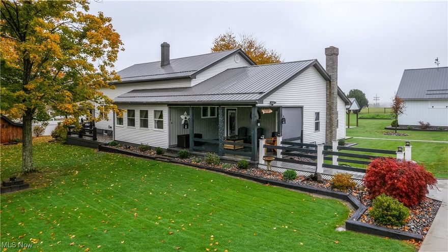 Take a look at this stunning property sitting on over 7 acres! The main kitchen is very spacious, has hardwood flooring, white marble countertops, grey cabinetry, and a dine-in area in the middle. There's a large family room with a fireplace that heats the house, a living room with barn style doors, and a sun room all right off of the kitchen. The main bathroom has a standing tub, a white and chocolate double-vanity, a large shower with tile flooring and tile wainscotting, and a large walk in closet. The basement is large and connects the house to the in-law suite. The 2nd kitchen is also very spacious, has hardwood flooring, dark grey countertops, light grey cabinetry, and a dine-in area in the middle. The 2nd living room has hardwood flooring, has an open concept, and a beautiful fireplace that heats the in-law suite. The 2nd bathroom has hardwood flooring, custom cabinetry with a vanity built in, and a white tile shower. There are several outbuildings including an office with a half bath and garage that is connected to a barn with multiple garage doors and a work area where the owners build their custom cabinets. There's a pavilion with a heat source and the ability to be enclosed for outdoor eating / activity. There's a beautiful shed to store tools and a car port to park any vehicles you don't want inside the garage areas. The paved driveway leads to every outbuilding making it very convenient. The lot has plenty of space for gardens, play areas for kids, and a fenced in pasture for animals. Come and make this immaculate property yours today!