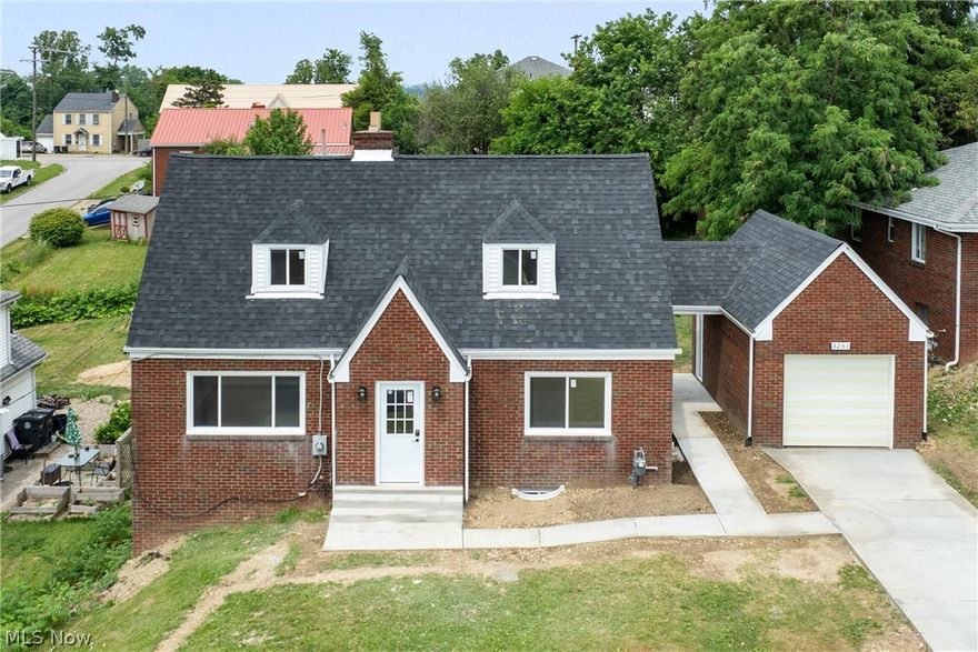 Welcome to 3261 Portland Boulevard! This meticulously remodeled home is move-in ready and waiting for you to make it your own. As you approach the house, the brand-new driveway and sidewalk make an excellent first impression. Step inside to discover unique character in every room, with an abundance of natural light through brand-new windows. Upon entering, you'll be greeted by a spacious living room featuring a decorative glass fireplace. The dining room seamlessly flows into the kitchen, creating an ideal space for entertaining. The kitchen boasts new cabinetry, and fixtures, ensuring a modern and functional culinary experience. This home offers three fully renovated bathrooms: a convenient half bath on the main floor, a full bath upstairs, and another full bath in the basement. With four bedrooms, including an expansive bedroom on the lower level, there is ample space for family and guests. Each bedroom features generous closet space, and the basement provides easy walk-up access through the laundry room. The basement has been thoroughly cleaned, sealed, and painted, offering a polished and comfortable environment. Enjoy peace of mind with the brand-new roof, doors, windows, and garage door. The spacious backyard is perfect for outdoor activities and relaxation. With a newer furnace, 200-amp electric box, and water tank, you can rest easy knowing that major updates have already been taken care of.  If you want to live comfortably without worrying about renovations or updates, THIS IS YOUR HOME. Conveniently located minutes away from Bishop Muscio Elementary School, Catholic Central High School, Trinity Hospital, and many other local amenities. Don't miss out on this incredible opportunity. Call an agent for a private showing today – this home won’t last long!