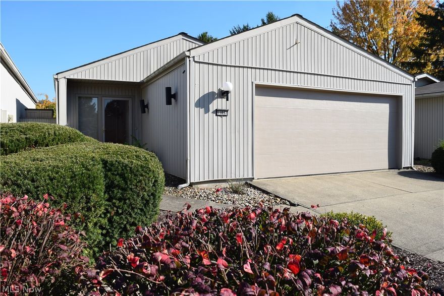 Comfortable and Private w/large Great Room, Eat-In Kitchen & Two Good Sized Bedrooms. A covered front door & foyer welcome Family & Guests. The kitchen provides space for morning coffee, informal gatherings & cooking those holiday meals. A desk adds convenience for tracking household expenses. The Private 16x12 patio is just outside the sliding door. The Great Room offers living and formal dining areas highlighted by a wood burning fireplace and bookcase wall. The laundry/utility room has good storage & a side door to patio. The master suite includes a 7x7 walk-in closet & private bath. Both bedrooms have a large window facing the enclosed patio path. The garage is 21x21 w/power, sewer, water & storage. Buy this Cluster and enjoy Meadwood Amenities.