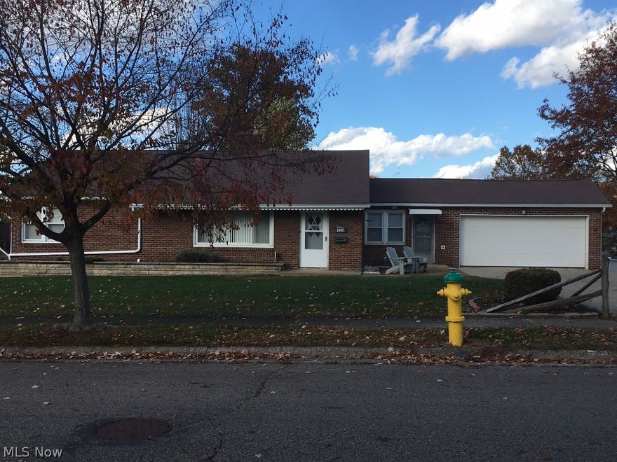 2 bed 2 bath brick ranch with roommate income potential, 1323 s.f., 2-car attached garage. New A/C 2021, new Trane furnace 2016, new sewer system 2020, security system, upstairs laundry, full basement with roommate potential in the 3/4 finished basement having a full kitchen, nice bedroom, full bath, and private entrance. Only the laundry room and entry way in the basement are not finished. Nice outdoor steps to lower-level entrance. Walking distance to 2 grocery stores, 2 pharmacies, USPS, salon, restaurants, and close, easy access to 224, 77, 76, and 8. Hardwood floors. Double lot. Two fireplaces. The basement has a bedroom which is not on the tax record because the closet is built in the next room. The basement bathroom was remodeled in 2018.