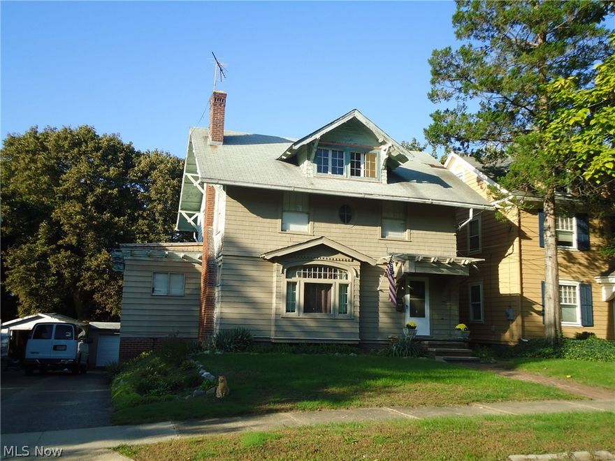 Classic West Akron home loaded with charm, character and Old World craftsmanship.....just  looking for someone to restore it to the beauty and elegance of 1913 at the time it was built.  Spacious (2,286 sf) 4 BR/ 1 1/2 BTH home in well established neighborhood.
Beautiful Hardwood flooring--trim--crown molding---beamed ceilings----loads of built-ins---fireplaced living room----large rooms throughout.
This home needs work but could be a great home for the right buyer.....great area with much higher values nearby for similar size homes.   Could be good equity for a homeowner or investor.     Convenient location near Highland Square district, shopping,  schools and parks.
Call today for your private showing.