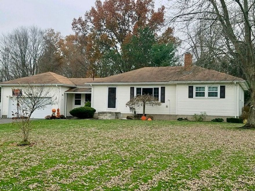 Charming Updated 3 Bedroom Ranch sitting on 2.65 acres. Best Of Both Worlds! Easy 1 Floor Living but Scenic Property with creek and woods to enjoy. Updated CVS windows.   Brand new laminate flooring in eat in kitchen and dining room. Kitchen appliances stay.  Nice size living room with hardwood floors. Full walk out basement. Beautiful covered back deck, patio and above ground pool for relaxing and entertaining.  2 car attached garage and 24x24 pole barn for multiple purpose use. Building has 16x8 lean-to. Home Warranty is provided to give you that extra peace of mind. Call Today for Your Personal Showing!