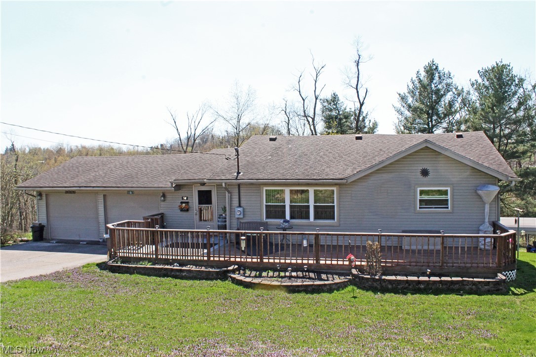 Looking for a slice of peace and quiet? Here it is with this 3 bedroom, 2 bath ranch on an acre right off Apple Pie Ridge in Wellsburg! Inviting living room, updated fully equipped kitchen with island, first-floor laundry plus finished rec room with bar area, two car garage and plenty of room for storage, including a bonus area with a 10 foot garage door. Newer Pella windows throughout. Call today to schedule a tour of this charming property!
