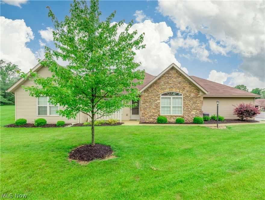 This ranch-style condo on desirable Fiddler’s Creek in North Canton is in mint condition. Spacious, open, and airy with cathedral ceilings, skylights, an abundance of storage, and was built with convenience and comfort in mind. Upon entering this fabulous home, you are greeted by a spacious open great room with vaulted ceilings, double skylights, and a dining area with recessed lighting. The kitchen is open to the great room and dinette and offers a breakfast bar, stainless steel appliances, granite countertops, beautiful tiles backsplash, tile floors, and loads of pull-out drawers. The master suite has a private bath with a walk-in shower, a walk-in closet (6x8), and a linen closet. The lovely sunroom can be used as an office. Adjacent to the kitchen is the laundry with extra cabinets, a utility sink, and a closet for storage. The two-car garage has additional double closets for extra storage. Enjoy the cozy private patio on beautiful summer days—great North Canton location, close to