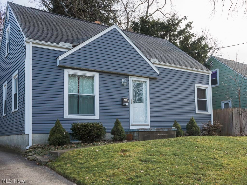 Updated Cape with Modern Laminate Flooring in Kitchen, Subway Tile, Freshly Painted Cabinets, Stainless Steel Stove & Refrigerator. Eat in Kitchen. Two Bedrooms on First Floor and One Large Bedroom on Second Floor. Newer Siding, Windows (2008), New Roof (2007), Hot Water Tank, Doors & Gutters. Nice Size Deck and Ample Backyard. Home Warranty Included! Easy Access to Highway, Shopping & Parks.