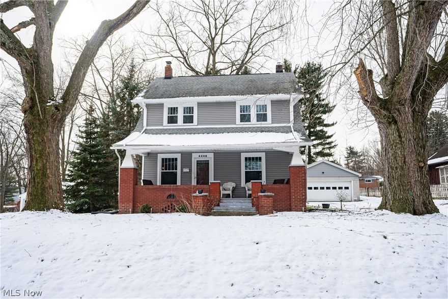 Welcome to this beautiful colonial home on a deep wooded lot in Perry Township. From the covered front porch you will walk into the lovely living room with tall ceilings and refinished original hardwood flooring. Cozy up by the wood burning fireplace with a brand new flew and insert for all to enjoy. The dining room is a great size and complete with charming chair rail molding. The kitchen has newer appliances, lots of storage and newer engineered hardwood flooring. The upstairs bathroom has been COMPLETELY remodeled with a tiled shower, deep soaker tub, double sink and tiled flooring. Three bedrooms complete the second floor and there is a walk up attic great for storage. The basement is partially finished and has a full bathroom as well. The washer and dryer stay! The garage is an OVERSIZED two car garage. Tranquil park like backyard. All new electric on the second floor (2017), most windows are new energy efficient (2019), new gutters and leaf guards (2019). Don't miss your opportun
